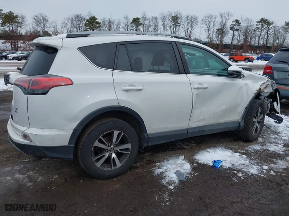 2017 Toyota RAV4 XLE with VIN 2T3RFREV4HW673525, listed as a IAAI auction lot 41503904 with 75,281 mi miles. Bid and sale history available at carsss.com. Image 4.