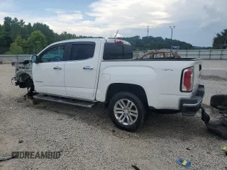 2019 GMC Canyon 4WD SLT with VIN 1GTG6DEN8K1274729, listed as a Copart auction lot 60804575 with 107,382 mi miles and Salvage title. Bid and sale history available at DreamBid. Image 2.