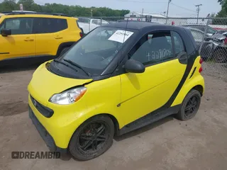 2013 Smart fortwo Pure with VIN WMEEJ3BA5DK663165, listed as a IAAI auction lot 42291804 with 105,074 mi miles and . Bid and sale history available at DreamBid. Image 2.