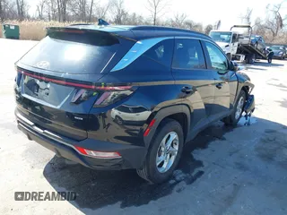 2022 Hyundai Tucson Preferred z VIN KM8JBCAE7NU065076, wystawiony jako IAAI lot #41769597 z przebiegiem 20 813 mil mil oraz . Historia ofert i sprzedaży dostępna na DreamBid. Obrazek 4.