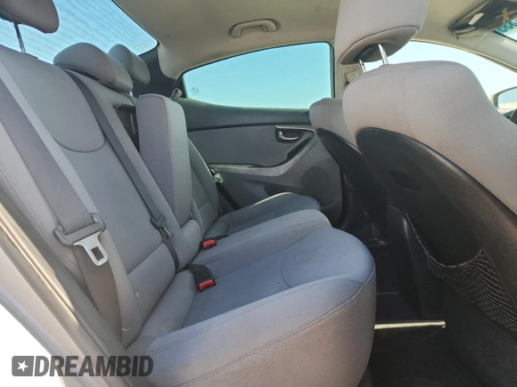 2013 Hyundai Elantra GLS z VIN KMHDH4AE3DU731009, wystawiony jako Copart lot #58668335 z przebiegiem 213 093 mil mil oraz Szkoda całkowita • Salvage title. Historia ofert i sprzedaży dostępna na DreamBid. Obrazek 10.