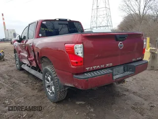 2017 Nissan Titan XD PRO-4X with VIN 1N6BA1F41HN570333, listed as a IAAI auction lot 41741250 with 62,948 mi miles. Bid and sale history available at carsss.com. Image 3.