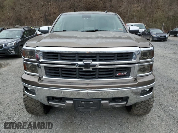 2014 Chevrolet Silverado 1500 LTZ with VIN 1GCVKSEC0EZ140325, listed as a Copart auction lot 52954845 with 128,231 mi miles and Salvage Title. Bid and sale history available at DreamBid. Image 5.