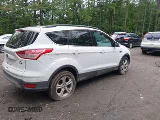 2014 Ford Escape SE with VIN 1FMCU9GX8EUB20861, listed as a IAAI auction lot 42711534 with Not provided miles and . Bid and sale history available at DreamBid. Image 4.