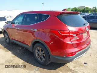 2014 Hyundai Santa Fe with VIN 5XYZT3LB1EG134837, listed as a IAAI auction lot 42454126 with 118,225 mi miles and . Bid and sale history available at DreamBid. Image 3.