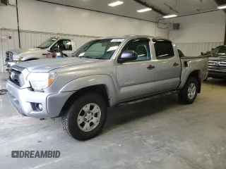 2015 Toyota Tacoma with VIN 3TMLU4EN7FM170049, listed as a Copart auction lot 52083725 with 162,062 mi miles and Salvage Title. Bid and sale history available at DreamBid. Image 1.