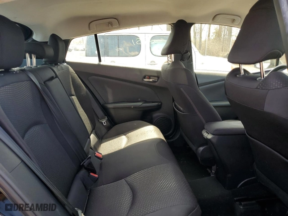 2021 Toyota Prius L Eco with VIN JTDKAMFU6M3150108, listed as a Copart auction lot 53690385 with 105,765 mi miles and Salvage Title. Bid and sale history available at carsss.com. Image 10.