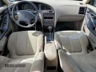 2003 Hyundai Elantra GLS z VIN KMHDN45D03U468955, wystawiony jako Copart lot #50207515 z przebiegiem 123 560 mil mil oraz Czysty tytuł • Clean title. Historia ofert i sprzedaży dostępna na DreamBid. Obrazek 8.