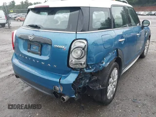 2019 MINI Countryman Cooper S with VIN WMZYT5C52K3G93902, listed as a IAAI auction lot 42650523 with 99,538 mi miles and . Bid and sale history available at DreamBid. Image 6.