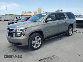 2019 Chevrolet Suburban LT z VIN 1GNSCHKC5KR257960, wystawiony jako Copart lot #60000315 z przebiegiem 180 618 mil mil oraz Czysty tytuł • Clean title. Historia ofert i sprzedaży dostępna na DreamBid. Obrazek 1.