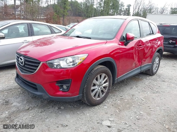 2016 Mazda CX-5 Touring with VIN JM3KE2CY3G0894441, listed as a IAAI auction lot 41508767 with NaN miles. Bid and sale history available at carsss.com. Image 2.