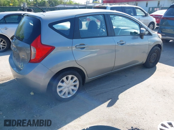 2014 Nissan Note SV with VIN 3N1CE2CP0EL404867, listed as a IAAI auction lot 42150285 with 124,370 mi miles and . Bid and sale history available at DreamBid. Image 4.