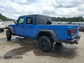2023 Jeep Gladiator Sport S with VIN 1C6HJTAG3PL593284, listed as a Copart auction lot 57292935 with Not provided miles and Salvage title. Bid and sale history available at DreamBid. Image 2.