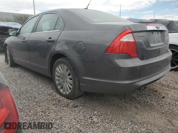2011 Ford Fusion Hybrid с VIN 3FADP0L39BR214920, выставлен на аукционе Copart как лот 57888465 с пробегом 133 656 миль миль и Списание • Salvage title. История ставок и продаж доступна на DreamBid. Изображение 2.