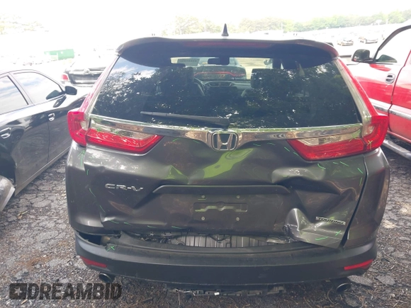 2018 Honda CR-V Touring z VIN 7FARW1H9XJE040530, wystawiony jako IAAI lot #42227446 z przebiegiem 101 299 mil mil oraz . Historia ofert i sprzedaży dostępna na DreamBid. Obrazek 16.