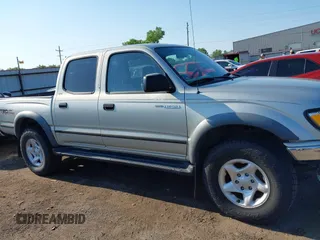 2001 Toyota Tacoma PreRunner z VIN 5TEGN92N41Z768370, wystawiony jako IAAI lot #42228571 z przebiegiem 172 317 mil mil oraz . Historia ofert i sprzedaży dostępna na DreamBid. Obrazek 14.