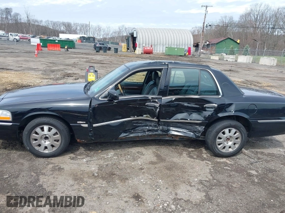 2005 Mercury Grand Marquis LS Premium z VIN 2MEFM75W65X671622, wystawiony jako IAAI lot #41958287 z przebiegiem 154 662 mil mil oraz . Historia ofert i sprzedaży dostępna na DreamBid. Obrazek 14.