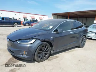 2017 Tesla Model X 90D with VIN 5YJXCBE22HF079194, listed as a IAAI auction lot 41895591 with 102,437 mi miles and . Bid and sale history available at DreamBid. Image 17.