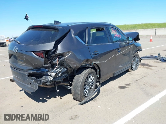 2019 Mazda CX-5 Touring with VIN JM3KFACM1K0533142, listed as a IAAI auction lot 41880181 with Not Provided miles and . Bid and sale history available at carsss.com. Image 4.