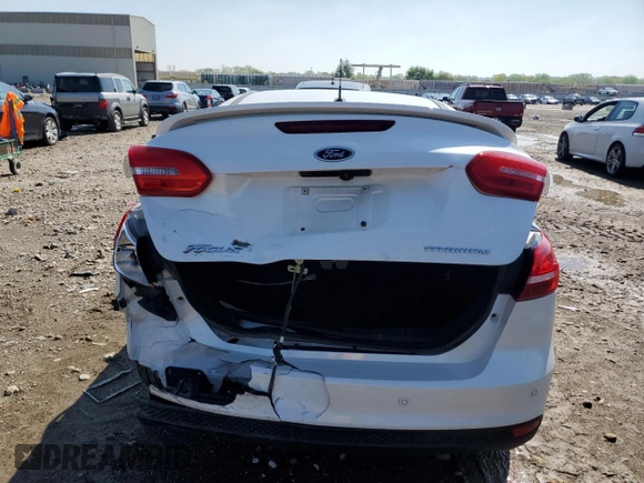 2018 Ford Focus Titanium with VIN 1FADP3J21JL294061, listed as a Copart auction lot 53827375 with 194,577 mi miles and Salvage title. Bid and sale history available at DreamBid. Image 6.