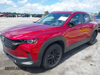 2025 Mazda CX-50 S Preferred z VIN 7MMVABBM9SN332278, wystawiony jako IAAI lot #42203025 z przebiegiem 3673 mil mil oraz . Historia ofert i sprzedaży dostępna na DreamBid. Obrazek 2.