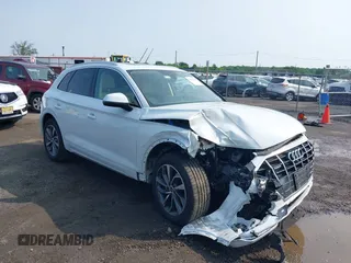 2021 Audi Q5 Premium Plus with VIN WA1BAAFYXM2050028, listed as a IAAI auction lot 42479898 with 39,015 mi miles and . Bid and sale history available at DreamBid. Image 1.