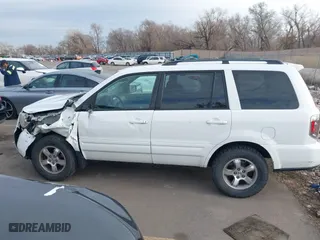 2006 Honda Pilot EX-L with VIN 2HKYF18576H517590, listed as a IAAI auction lot 41802601 with 233,833 mi miles. Bid and sale history available at carsss.com. Image 14.