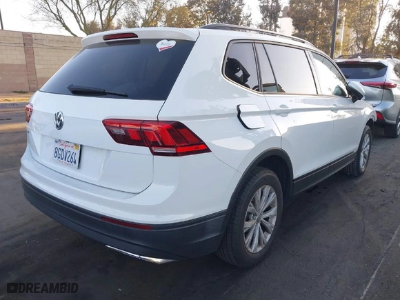 2019 Volkswagen Tiguan S with VIN 3VV1B7AX4KM009210, listed as a IAAI auction lot 41864482 with 47,987 mi miles. Bid and sale history available at carsss.com. Image 4.