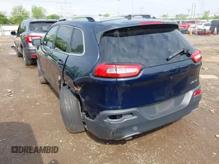 2015 Jeep Cherokee Limited with VIN 1C4PJLDBXFW658441, listed as a IAAI auction lot 42167135 with Not Provided miles and . Bid and sale history available at DreamBid. Image 3.