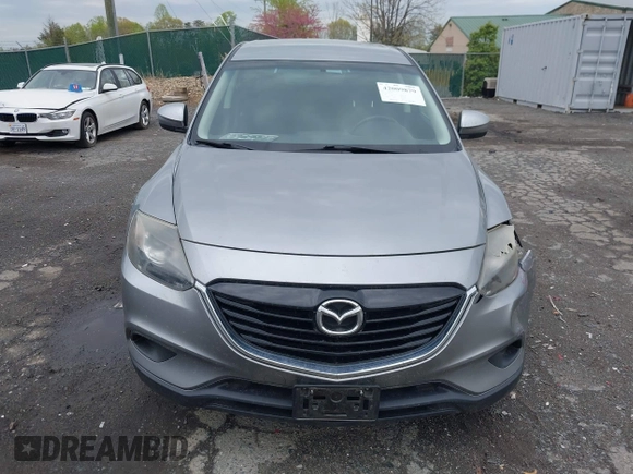 2015 Mazda CX-9 Sport with VIN JM3TB3BV2F0454770, listed as a IAAI auction lot 42009879 with 98,916 mi miles and . Bid and sale history available at carsss.com. Image 12.