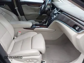 2014 Cadillac XTS Luxury z VIN 2G61N5S38E9292684, wystawiony jako IAAI lot #41842596 z przebiegiem 130 318 mil mil oraz . Historia ofert i sprzedaży dostępna na DreamBid. Obrazek 5.