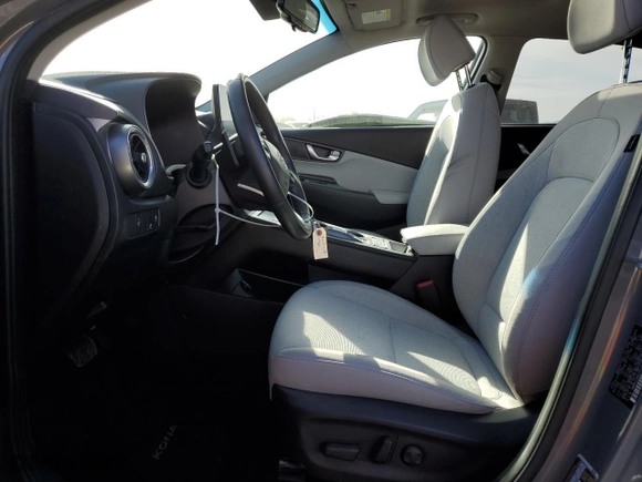 2023 Hyundai Kona Electric SEL with VIN KM8K33AG1PU165566, listed as a Copart auction lot 46165965 with 9,832 mi miles and Salvage Title. Bid and sale history available at carsss.com. Image 7.