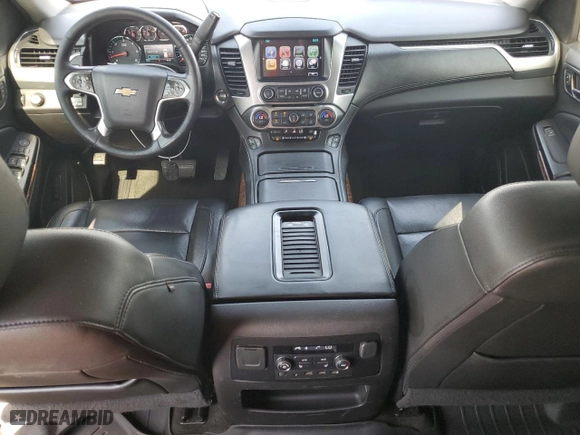 2017 Chevrolet Suburban Premier with VIN 1GNSCJKC0HR140111, listed as a Copart auction lot 74387664 with 104,094 mi miles and Salvage Title. Bid and sale history available at carsss.com. Image 8.