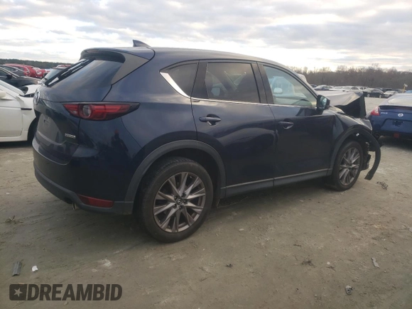 2020 Mazda CX-5 Grand Touring with VIN JM3KFADM4L1783968, listed as a Copart auction lot 85994244 with 89,074 mi miles and Salvage Title. Bid and sale history available at DreamBid. Image 3.