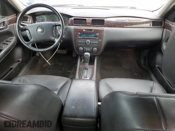 2014 Chevrolet Impala LTZ with VIN 2G1WC5E3XE1185115, listed as a Copart auction lot 60690785 with 119,947 mi miles and Salvage title. Bid and sale history available at DreamBid. Image 8.