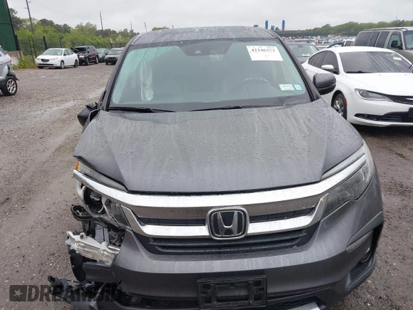 2021 Honda Pilot EX-L with VIN 5FNYF6H5XMB048102, listed as a IAAI auction lot 42346372 with 45,042 mi miles and . Bid and sale history available at DreamBid. Image 12.