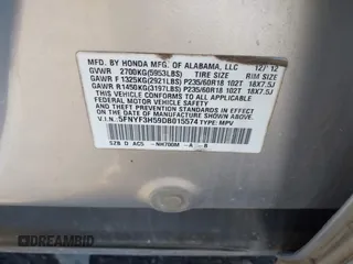 2013 Honda Pilot EX-L with VIN 5FNYF3H59DB015574, listed as a IAAI auction lot 38777512 with Not Provided miles and . Bid and sale history available at DreamBid. Image 9.