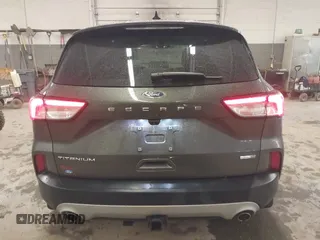 2020 Ford Escape Titanium with VIN 1FMCU9J95LUA39338, listed as a IAAI auction lot 42319122 with 34,631 mi miles and . Bid and sale history available at DreamBid. Image 17.