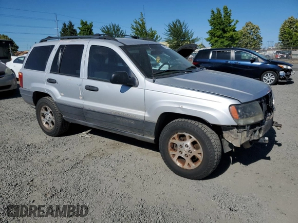 2004 Jeep Grand Cherokee Laredo with VIN 1J4GW48S54C103651, listed as a Copart auction lot 62972615 with 188,000 mi miles and Clean title. Bid and sale history available at DreamBid. Image 4.