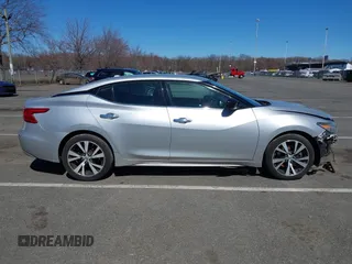 2016 Nissan Maxima SV z VIN 1N4AA6AP0GC905126, wystawiony jako IAAI lot #41849223 z przebiegiem 87 968 mil mil oraz . Historia ofert i sprzedaży dostępna na DreamBid. Obrazek 13.