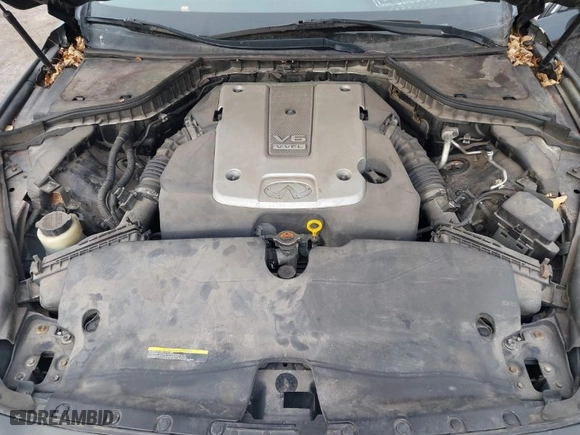 2015 Infiniti Q50 Premium with VIN JN1BV7AR9FM399558, listed as a IAAI auction lot 41642026 with 84,562 mi miles. Bid and sale history available at carsss.com. Image 10.