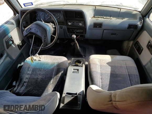 1990 Ford Bronco z VIN 1FMCU12T2LUA31399, wystawiony jako Copart lot #77099614 z przebiegiem 85 663 mil mil oraz Szkoda całkowita • Salvage title. Historia ofert i sprzedaży dostępna na DreamBid. Obrazek 8.