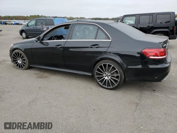 2014 Mercedes-Benz E 400 Sport with VIN WDDHF9FB4EA909283, listed as a Copart auction lot 73703584 with 73,857 mi miles and Salvage Title. Bid and sale history available at DreamBid. Image 2.