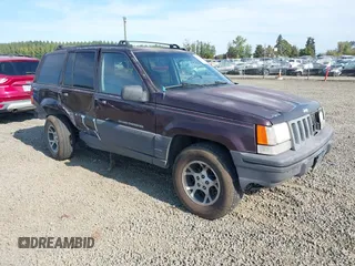 1996 Jeep Grand Cherokee Laredo with VIN 1J4GZ58S2TC262980, listed as a IAAI auction lot 41949514 with 269,674 mi miles and . Bid and sale history available at DreamBid. Image 1.