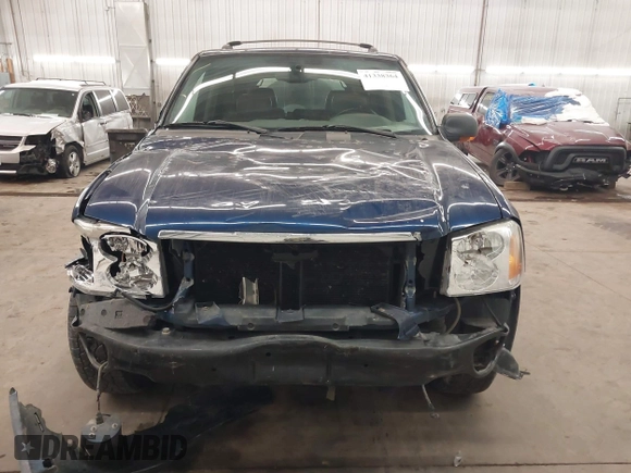 2002 GMC Envoy SLT with VIN 1GKDT13S022388743, listed as a IAAI auction lot 41338364 with 206,179 mi miles. Bid and sale history available at carsss.com. Image 13.