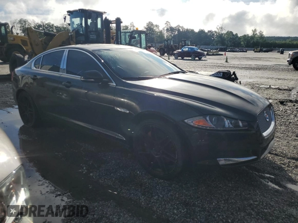 2014 Jaguar XF SC with VIN SAJWJ0EF0E8U31601, listed as a Copart auction lot 57146535 with 180,408 mi miles and Clean Title. Bid and sale history available at DreamBid. Image 4.