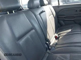2005 Honda Pilot EX-L with VIN 2HKYF18565H534394, listed as a IAAI auction lot 41539630 with 168,384 mi miles. Bid and sale history available at carsss.com. Image 8.