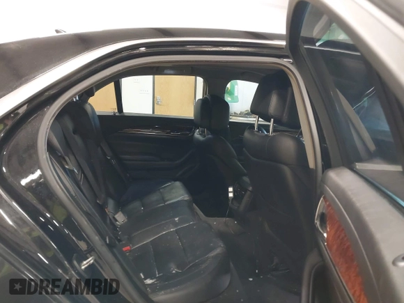 2014 Cadillac CTS Luxury AWD with VIN 1G6AX5S36E0173682, listed as a IAAI auction lot 41538709 with 102,772 mi miles and . Bid and sale history available at DreamBid. Image 8.