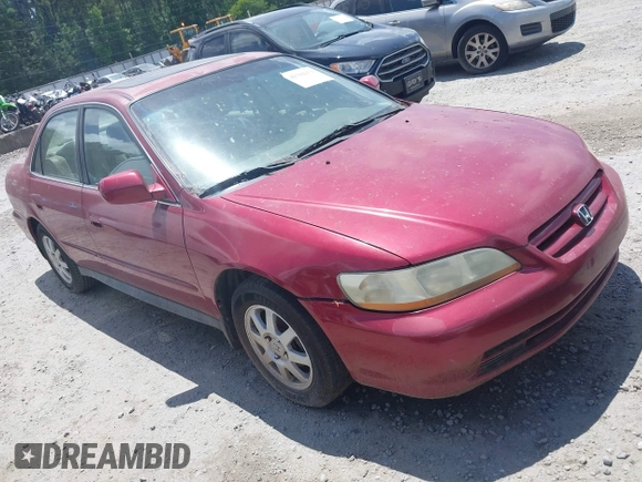 2002 Honda Accord SE z VIN 1HGCG56712A020105, wystawiony jako IAAI lot #42504254 z przebiegiem 317 533 mil mil oraz . Historia ofert i sprzedaży dostępna na DreamBid. Obrazek 1.