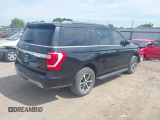 2019 Ford Expedition XLT with VIN 1FMJU1HT5KEA84864, listed as a IAAI auction lot 40174691 with 119,758 mi miles. Bid and sale history available at carsss.com. Image 4.